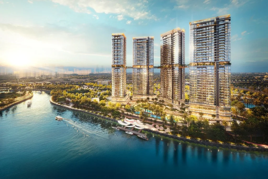 Phối cảnh bốn tháp Palm River bên sông lúc hoàng hôn.