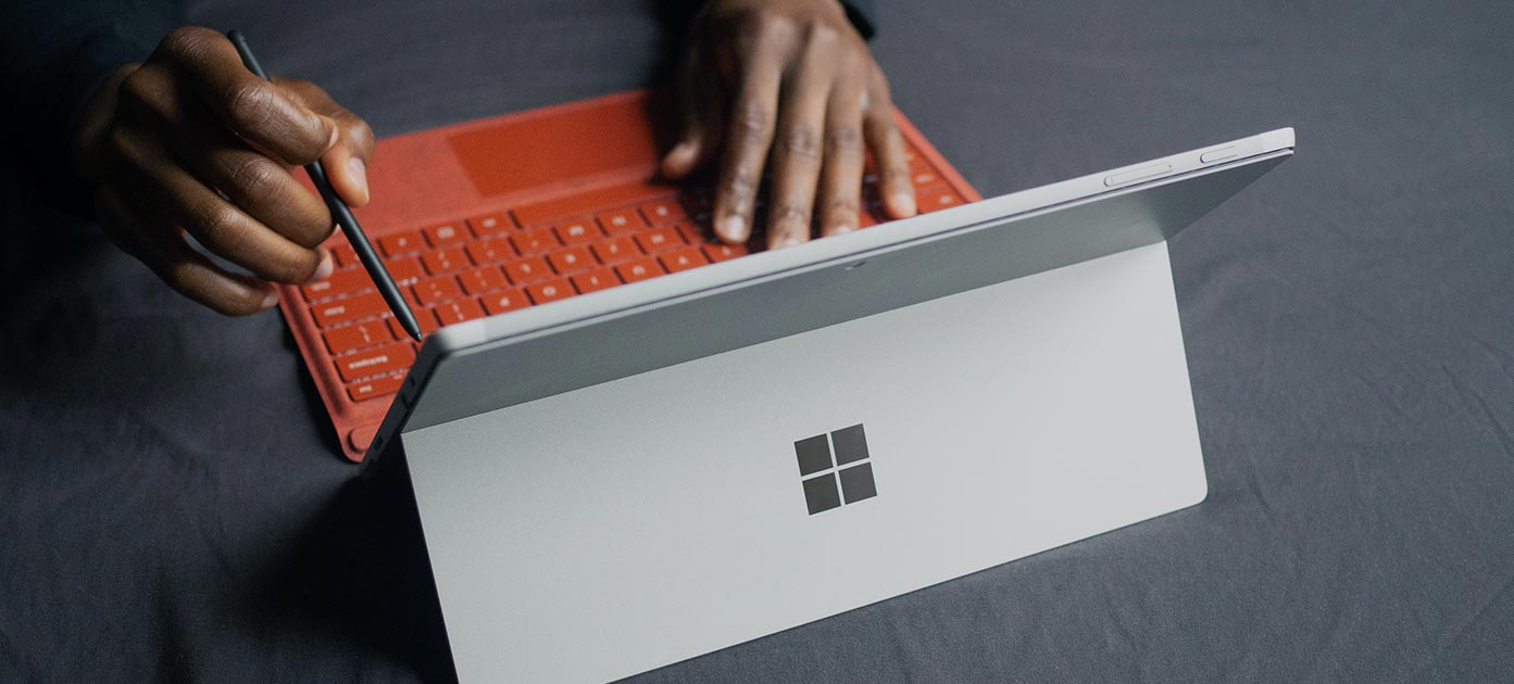 Man Working on a Tablet